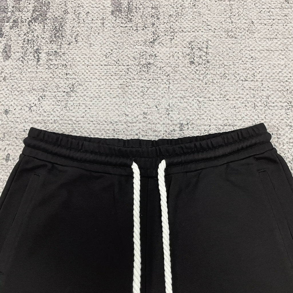 Elastic waistband and white drawstrings