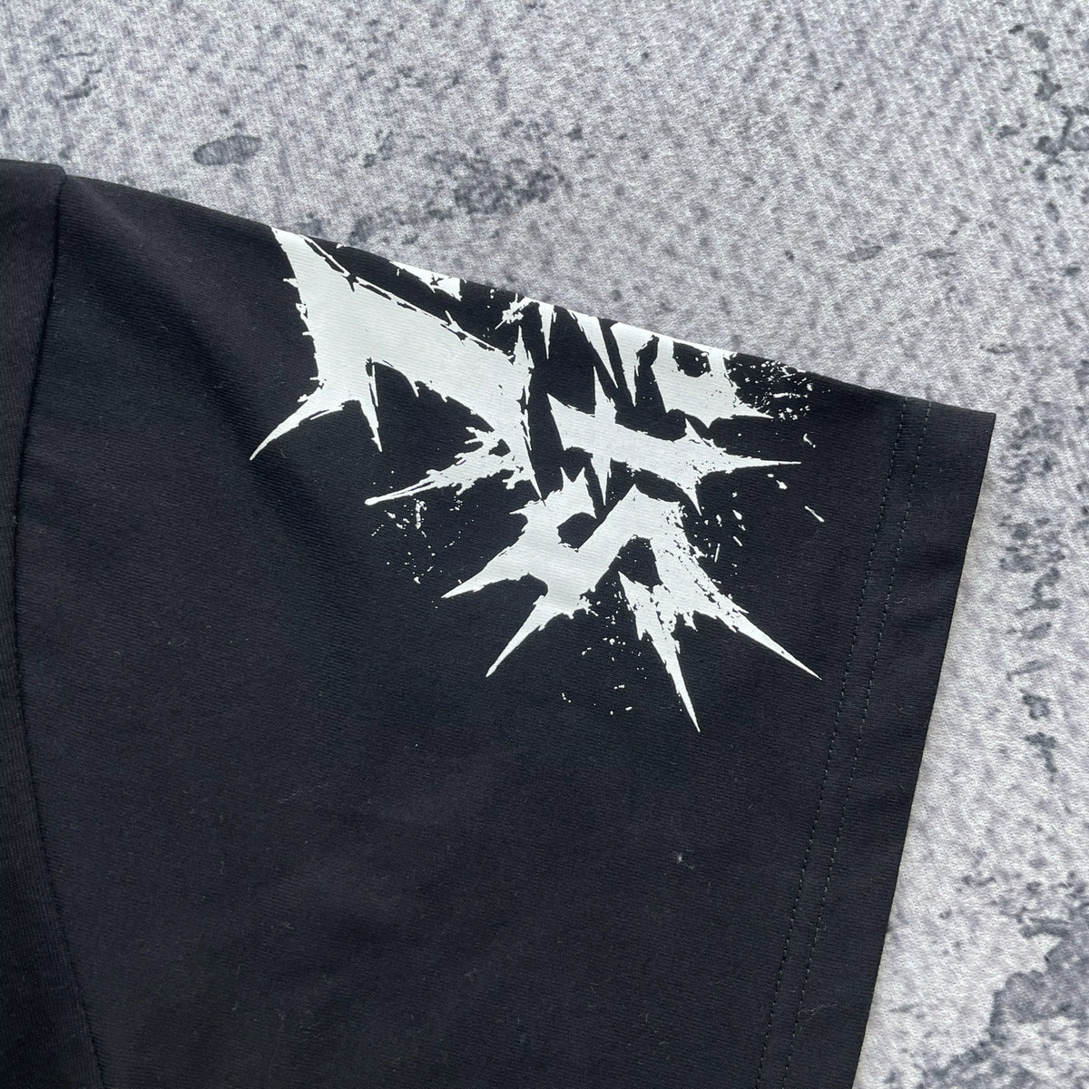 Front of black Project EL Beyond the Grave graphic T-shirt