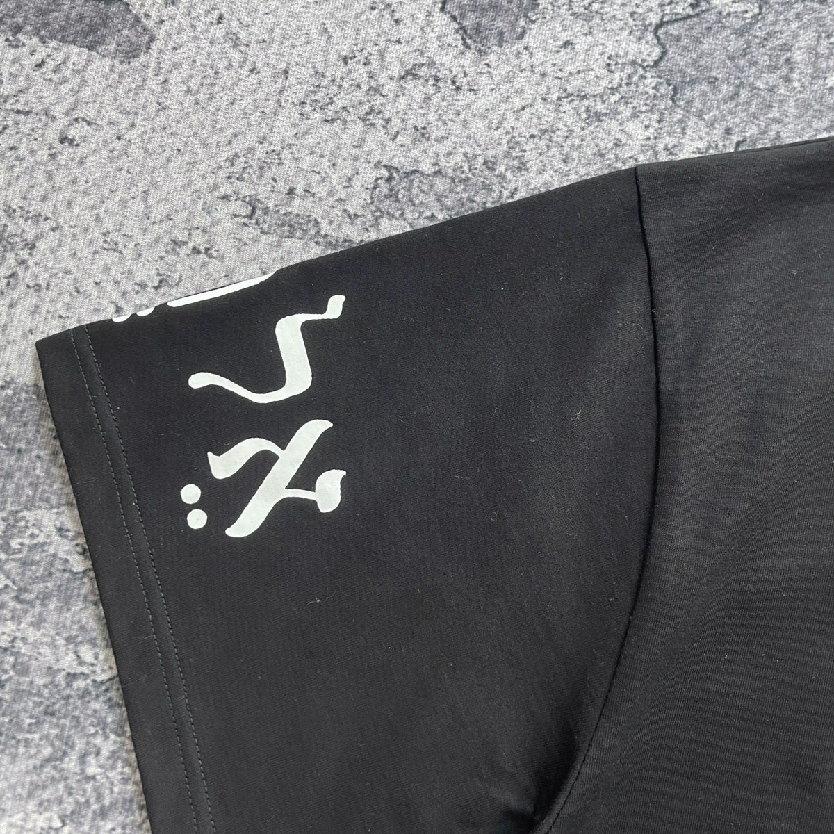 Back of black Project EL Beyond the Grave graphic T-shirt