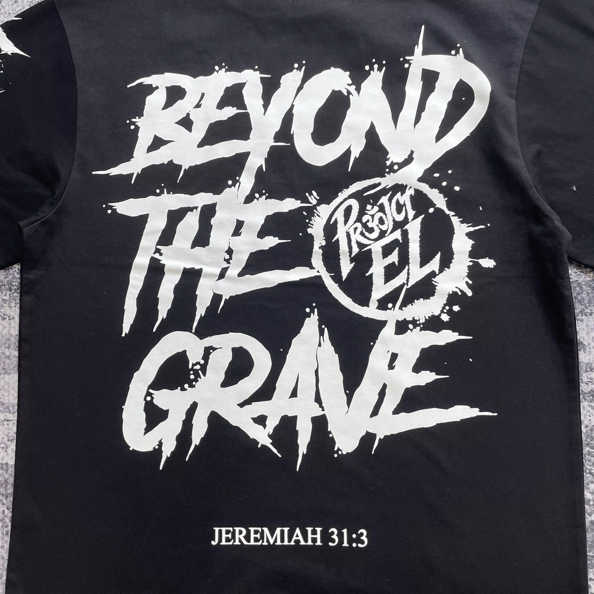 Close-up of white sleeve graphic